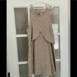 Free People sundress. A-line mini dress in a neutral Black and Tan stripe.